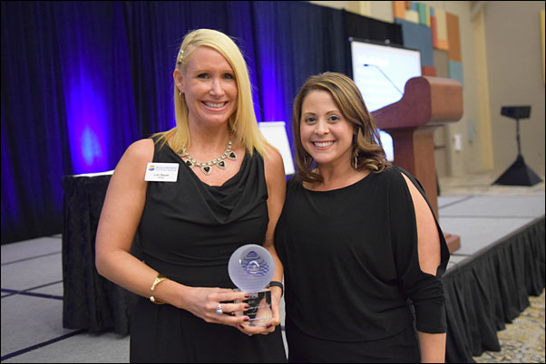 2015 PPAI RAC Volunteer of the Year Award recipient Lori Bauer (left) was nominated for her work with PPAF by PPAF Executive Director Dana Geiger.