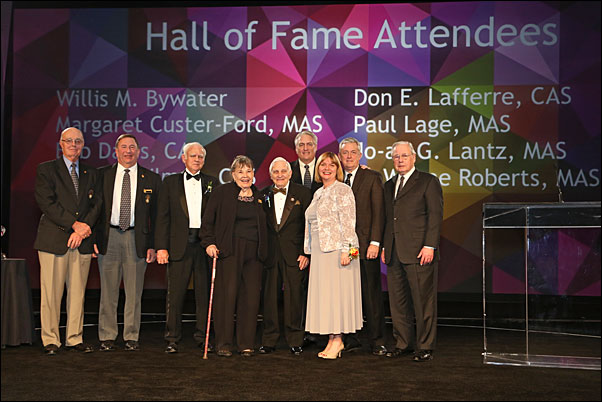 Lafferre (center) is joined on stage at the Expo's Chairman's Leadership Dinner with fellow inductees into the PPAI Hall of Fame.