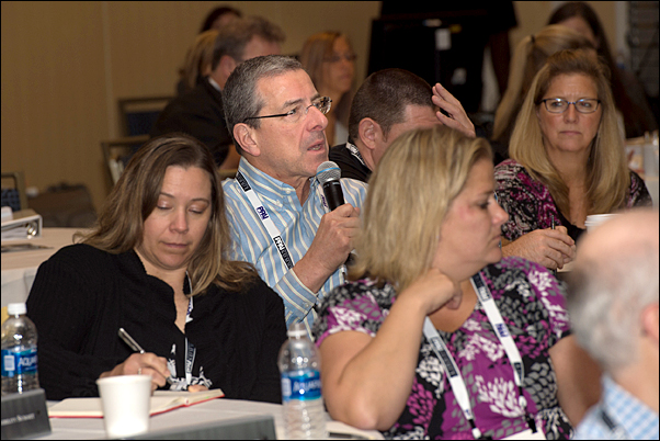 Summit Co-chair Gene Geiger comments during a session.