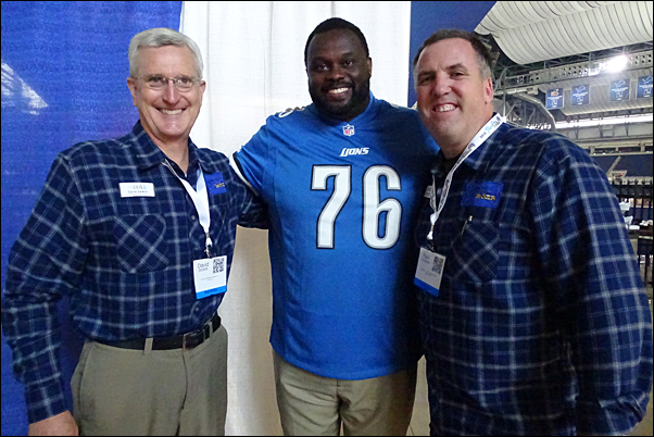 MiPPA Immediate Past President Dave DeWitt and President-Elect Paul Zafarana pose with Scott Conover, Detroit Lions offensive tackle, 1991-1996