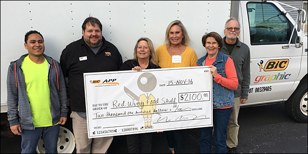 BIC Graphic associates delivered the food and funds collected on November 15. 