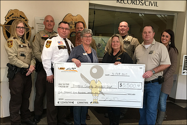 Cassie Otto, Deb Fleming and Linda Huppert (center) presented BIC Graphic Red Wing;s check to the Goodhue County Sheriff Department.