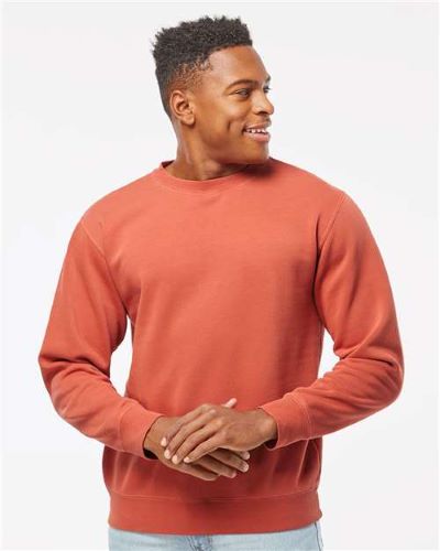 man wearing orange sweatshirt